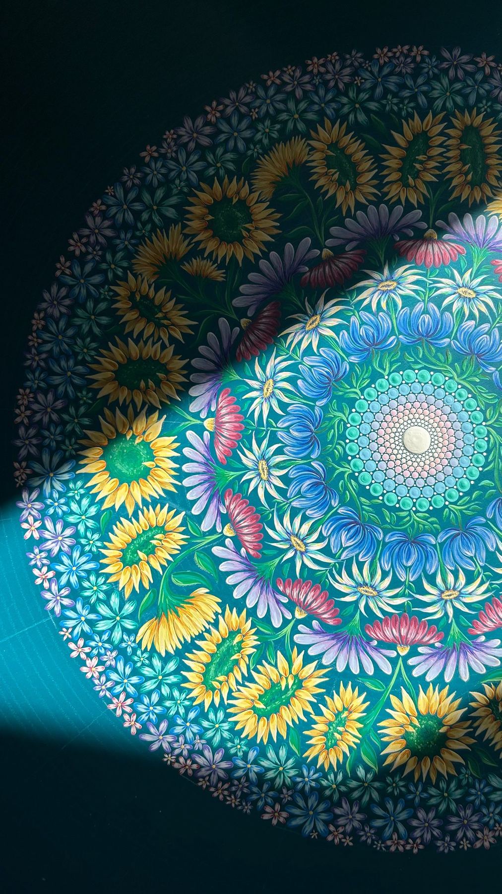 A geometric floral mandala with sunflowers