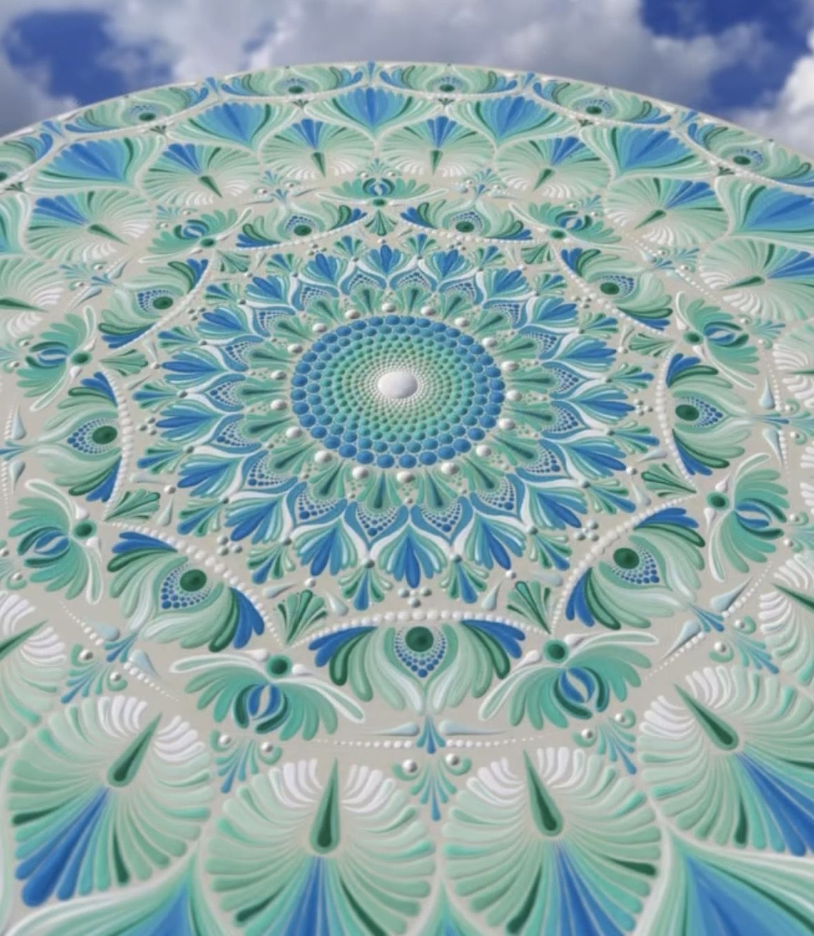 An advanced mandala painting by a TAC student, artist @pure_dots