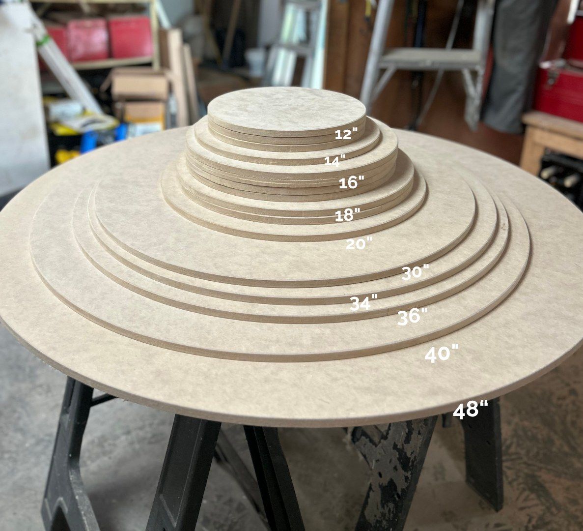 A stack of hand-cut mandala rounds from 12 inches to 48 inches