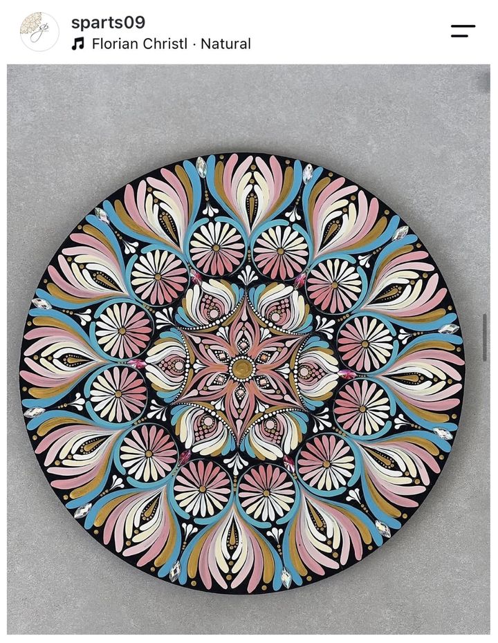 A student's 12-inch mandala painted from the free masterclass